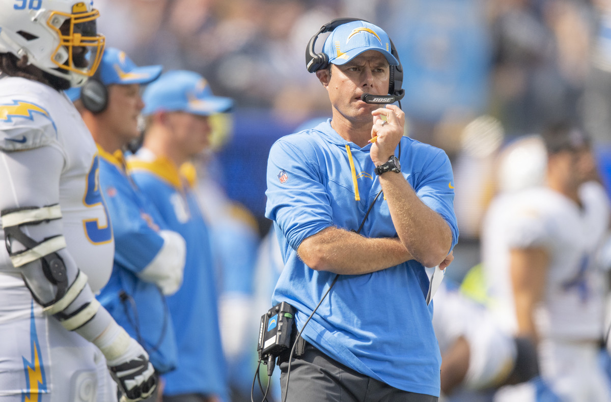 Brandon Staley on a headset during a Chargers game